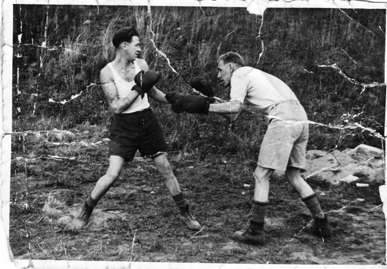 G. Drummond (right) Boxing in POW camp